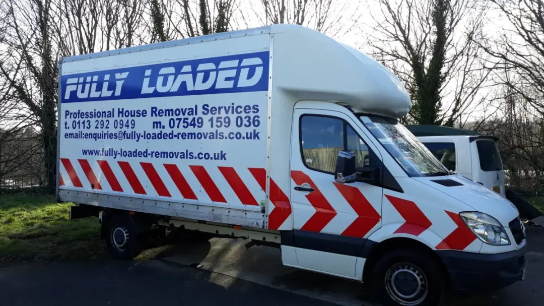 Fully Loaded Removals Luton van in the company livery